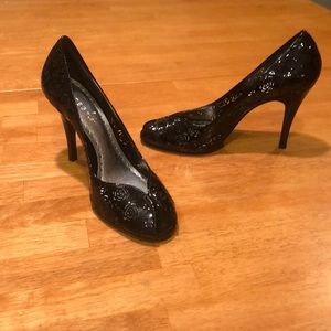 Black BCBGirls open toe party shoes.